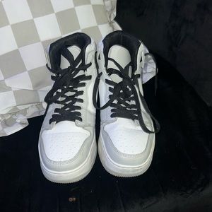 Gray and white sneakers